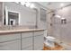 Modern bathroom with double vanity and walk-in shower at 32029 N 20Th Ln, Phoenix, AZ 85085