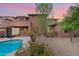 Spacious backyard with a pool, spa, and two story home at 32029 N 20Th Ln, Phoenix, AZ 85085