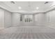 Bright and spacious bedroom with large windows and carpeting at 32029 N 20Th Ln, Phoenix, AZ 85085