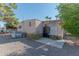 Single-wide manufactured home with a covered patio and gravel yard at 2650 W Union Hills Dr # 236, Phoenix, AZ 85027