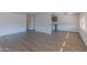 Open concept dining area with vinyl plank flooring and adjacent kitchen at 2650 W Union Hills Dr # 236, Phoenix, AZ 85027