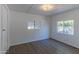 Bright bedroom with vinyl plank flooring and dual windows at 2650 W Union Hills Dr # 236, Phoenix, AZ 85027