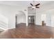 Spacious main bedroom with wood flooring and ceiling fan at 7313 E Jasmine St, Mesa, AZ 85207