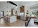 Gourmet kitchen boasts a huge island, custom cabinetry, and high-end appliances at 19980 E El Nido Ln, Litchfield Park, AZ 85340