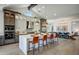 Gourmet kitchen boasts modern appliances and an expansive island with seating at 19980 E El Nido Ln, Litchfield Park, AZ 85340