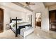 Bedroom with a post bed and en-suite bathroom access at 23036 N Via Ventosa Dr, Scottsdale, AZ 85255