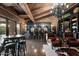 Elegant bar area with dark wood finishes and leather seating at 23036 N Via Ventosa Dr, Scottsdale, AZ 85255