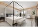 Bedroom with a four-poster bed and access to a private balcony at 23036 N Via Ventosa Dr, Scottsdale, AZ 85255