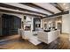 Living room with stone fireplace and hardwood floors at 23036 N Via Ventosa Dr, Scottsdale, AZ 85255