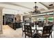 Gourmet kitchen boasts a large island, high-end appliances, and opens to a casual dining area at 23036 N Via Ventosa Dr, Scottsdale, AZ 85255