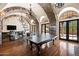 Spacious game room with ping pong, foosball, and views; perfect for entertaining at 23036 N Via Ventosa Dr, Scottsdale, AZ 85255