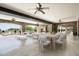 Covered patio boasts a lounge area, dining table and stunning views; perfect for entertaining at 23036 N Via Ventosa Dr, Scottsdale, AZ 85255