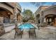Luxury pool with spacious patio and lounge chairs at 23036 N Via Ventosa Dr, Scottsdale, AZ 85255