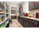 Well-organized pantry with ample shelving for storage at 20622 W Colter St, Buckeye, AZ 85396