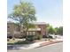 Two-story house with a landscaped yard and a tree in the front at 5160 W Fulton St, Phoenix, AZ 85043