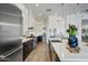Sleek kitchen boasts stainless steel appliances and a spacious layout at 19974 E El Nido Ln, Litchfield Park, AZ 85340