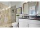 Modern bathroom with patterned tile shower and sleek vanity at 19974 E El Nido Ln, Litchfield Park, AZ 85340