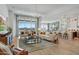 Open concept living room and kitchen with modern finishes at 19974 E El Nido Ln, Litchfield Park, AZ 85340