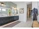 Elegant bathroom with dual vanities, a large shower, and walk-in closet at 19974 E El Nido Ln, Litchfield Park, AZ 85340