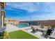 Relaxing pool area with fire pit and mountain views at 19974 E El Nido Ln, Litchfield Park, AZ 85340