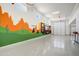 Bright garage with basketball hoop and desert-themed mural at 19974 E El Nido Ln, Litchfield Park, AZ 85340