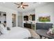 Guest bedroom with kitchenette and built-in entertainment center at 19974 E El Nido Ln, Litchfield Park, AZ 85340