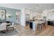 Modern kitchen with island and stainless steel appliances at 19974 E El Nido Ln, Litchfield Park, AZ 85340