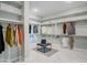 Large walk-in closet with ample shelving and hanging space at 19974 E El Nido Ln, Litchfield Park, AZ 85340