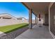 Landscaped backyard with artificial turf and covered patio at 3454 E Jasmine Way, San Tan Valley, AZ 85143
