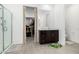 Elegant bathroom featuring a walk-in shower and a separate vanity at 3454 E Jasmine Way, San Tan Valley, AZ 85143