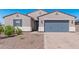 Modern two-story home with gray garage door and landscaping at 3454 E Jasmine Way, San Tan Valley, AZ 85143