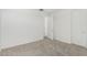 Spacious bedroom with carpeted floor and access to hallway at 3454 E Jasmine Way, San Tan Valley, AZ 85143