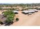 Aerial view of property showing house and stables at 1525 W Maddock Rd, Phoenix, AZ 85086