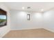 Well-lit bedroom with large window showcasing scenic views at 38306 N 108Th St, Scottsdale, AZ 85262