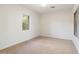 Bright and airy bedroom with neutral carpeting and large window at 38306 N 108Th St, Scottsdale, AZ 85262