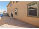 Small backyard with gravel and a concrete patio at 812 E Agua Fria Ln, Avondale, AZ 85323