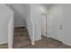 Carpeted stairs leading to the upper level of the home at 812 E Agua Fria Ln, Avondale, AZ 85323