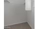 Spacious walk-in closet with wall-to-wall shelving at 812 E Agua Fria Ln, Avondale, AZ 85323