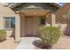 Two story house with covered entryway and landscaping at 812 E Agua Fria Ln, Avondale, AZ 85323