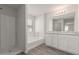 Bathroom with double vanity, soaking tub, and shower at 812 E Agua Fria Ln, Avondale, AZ 85323