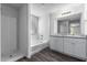 Bathroom with shower and tub, double vanity at 851 E Agua Fria Ln, Avondale, AZ 85323