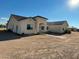 Single-story home with a neutral stucco exterior and landscaped walkway at 1527 E Germann Rd, San Tan Valley, AZ 85140