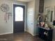 Inviting entryway with decorative mirror and coat rack at 1527 E Germann Rd, San Tan Valley, AZ 85140