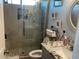 Updated bathroom with a walk-in shower, granite countertop, and modern fixtures at 1527 E Germann Rd, San Tan Valley, AZ 85140