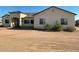Single-story home with a neutral color palette and well-maintained landscaping at 1527 E Germann Rd, San Tan Valley, AZ 85140