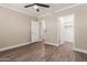 Well-lit bedroom with ceiling fan and walk-in closet at 9450 E Becker Ln # 1032, Scottsdale, AZ 85260