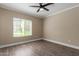 Bright bedroom with wood-look floors and ceiling fan at 9450 E Becker Ln # 1032, Scottsdale, AZ 85260