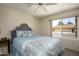 Guest bedroom with queen bed and views of the community at 7755 E Laguna Azul Ave # 241, Mesa, AZ 85209