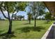 View of a lush green golf course from the patio at 7755 E Laguna Azul Ave # 241, Mesa, AZ 85209