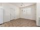 Bright kitchen nook features tile flooring and a view to backyard at 18552 W Capistrano Ave, Goodyear, AZ 85338